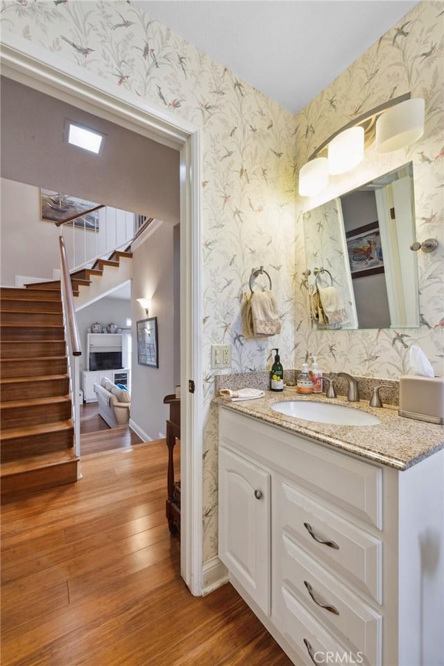 410 N Broadway Unit C, Redondo Beach, CA 90277 - bathroom featuring wallpapered walls, vanity, and wood finished floors