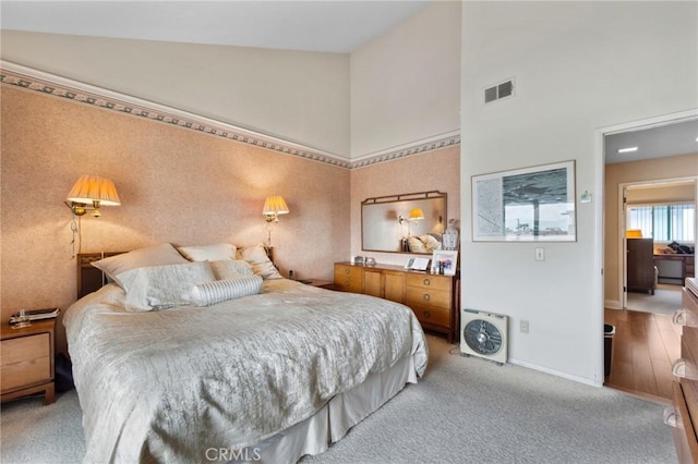410 N Broadway Unit C, Redondo Beach, CA 90277 - carpeted bedroom featuring high vaulted ceiling and baseboards
