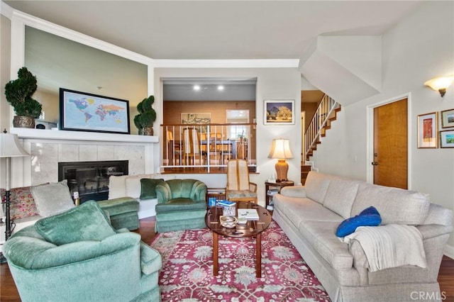410 N Broadway Unit C, Redondo Beach, CA 90277 - living room featuring stairway, a fireplace, wood finished floors, and crown molding