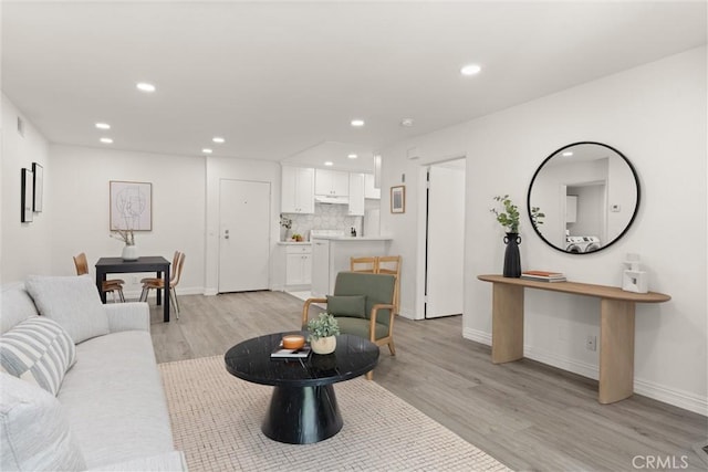 4210 Via Arbolada Unit 105, Los Angeles, CA 90042 - living room featuring light wood-type flooring and recessed lighting