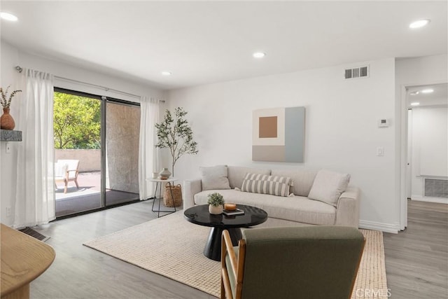 4210 Via Arbolada Unit 105, Los Angeles, CA 90042 - living room featuring wood finished floors and recessed lighting