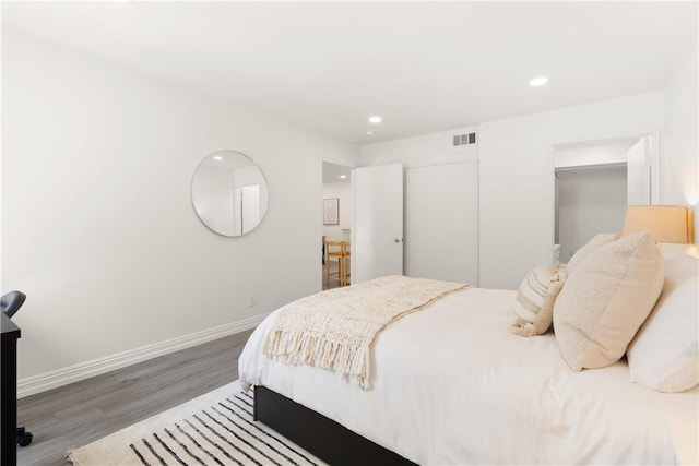 4210 Via Arbolada Unit 105, Los Angeles, CA 90042 - bedroom with wood finished floors and recessed lighting