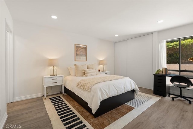 4210 Via Arbolada Unit 105, Los Angeles, CA 90042 - bedroom featuring light wood-type flooring and recessed lighting