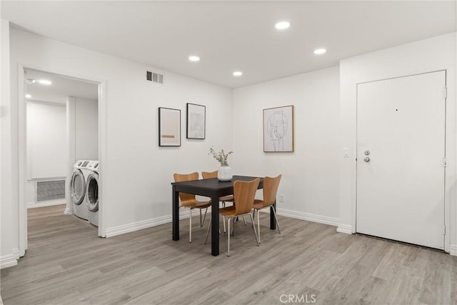 4210 Via Arbolada Unit 105, Los Angeles, CA 90042 - dining room with washer and clothes dryer, light wood-type flooring, and recessed lighting