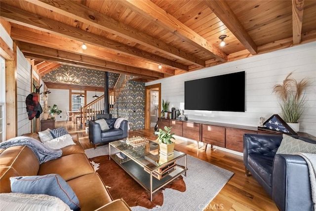 1186 Ramblin Rose Way, Arroyo Grande, CA 93420 - living room featuring stairs, light wood finished floors, wood walls, and a wooden ceiling with exposed beams