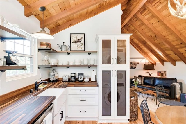 1186 Ramblin Rose Way, Arroyo Grande, CA 93420 - kitchen with wood ceiling, wood counters, glass insert cabinets, white cabinetry, and light wood-type flooring