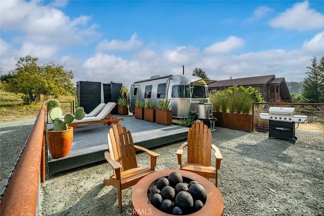 1186 Ramblin Rose Way, Arroyo Grande, CA 93420 - rear view of property with a fire pit and a wooden deck