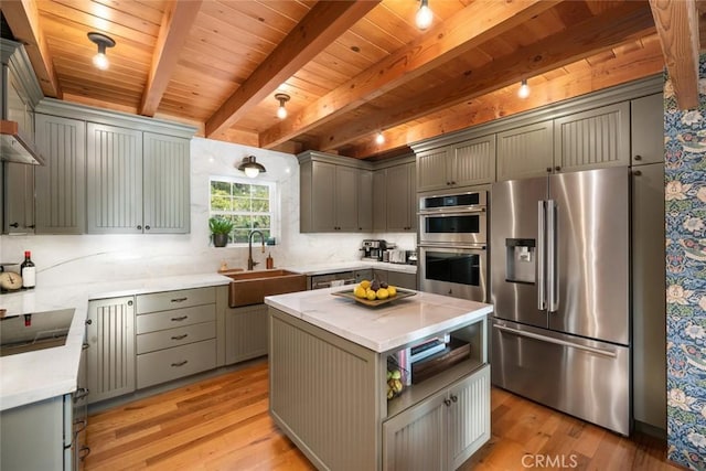 1186 Ramblin Rose Way, Arroyo Grande, CA 93420 - kitchen featuring stainless steel appliances, light wood-style flooring, light countertops, gray cabinetry, and a wooden ceiling with exposed beams