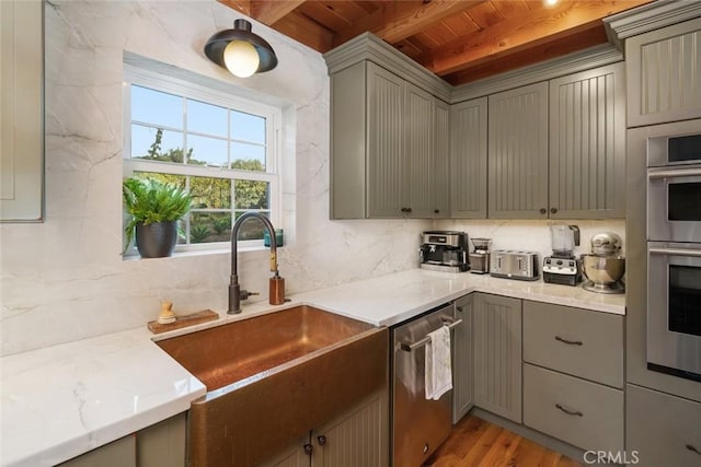 1186 Ramblin Rose Way, Arroyo Grande, CA 93420 - kitchen with stainless steel appliances, gray cabinets, a wooden ceiling with exposed beams, backsplash, and light wood-type flooring