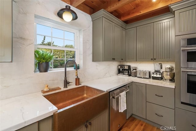 1186 Ramblin Rose Way, Arroyo Grande, CA 93420 - kitchen with stainless steel appliances, gray cabinets, a wooden ceiling with exposed beams, backsplash, and light wood-style flooring
