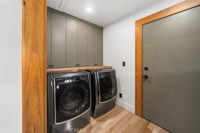1186 Ramblin Rose Way, Arroyo Grande, CA 93420 - laundry area with cabinet space, washer and clothes dryer, and light wood finished floors