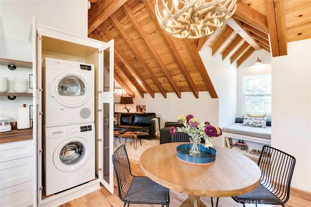 1186 Ramblin Rose Way, Arroyo Grande, CA 93420 - dining space featuring stacked washer / drying machine, wooden ceiling, light wood-style floors, and a chandelier