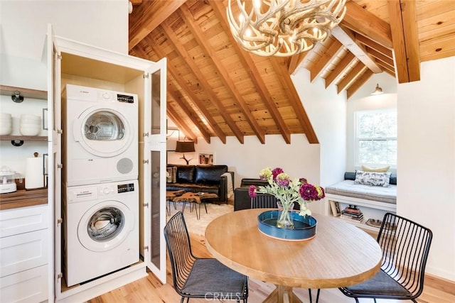 1186 Ramblin Rose Way, Arroyo Grande, CA 93420 - laundry room featuring stacked washing machine and dryer, wooden ceiling, light wood-style flooring, and a chandelier