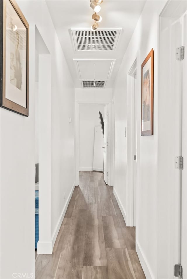 1954 Shipway Ave, Long Beach, CA 90815 - corridor with attic access and wood finished floors