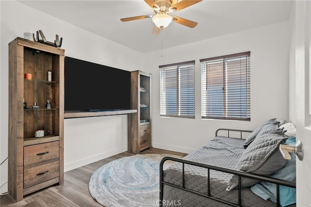 1954 Shipway Ave, Long Beach, CA 90815 - bedroom featuring wood finished floors and a ceiling fan