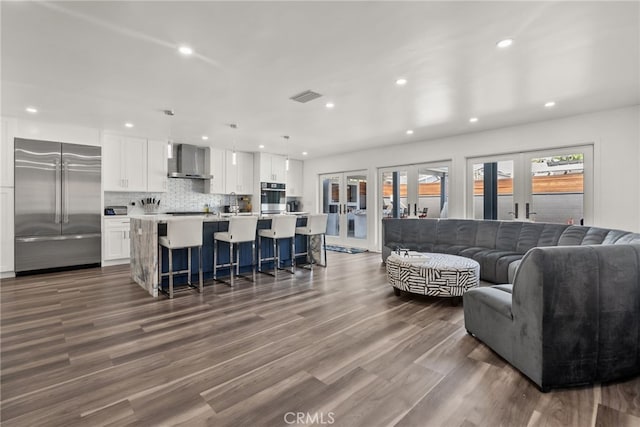 1954 Shipway Ave, Long Beach, CA 90815 - living area with french doors, recessed lighting, and dark wood-type flooring