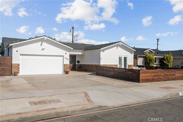 1954 Shipway Ave, Long Beach, CA 90815 - ranch-style home with stucco siding, stone siding, concrete driveway, and a garage
