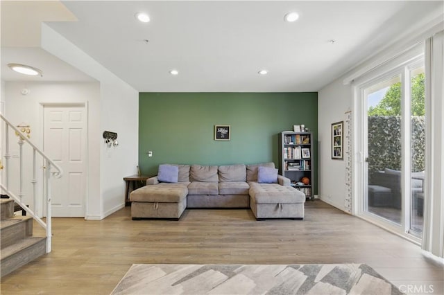 11445 Moorpark St Unit 12, Studio City, CA 91602 - living area featuring light wood-type flooring, stairway, and recessed lighting