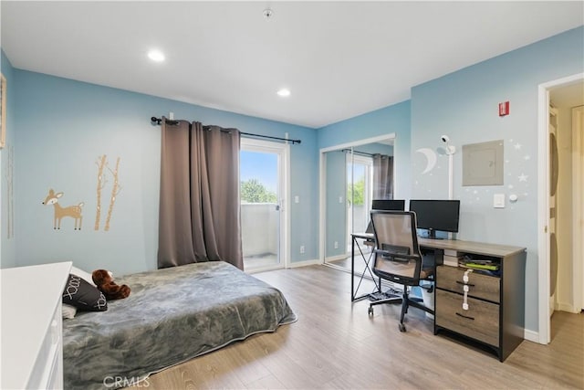 11445 Moorpark St Unit 12, Studio City, CA 91602 - bedroom with access to outside, light wood finished floors, an office area, and recessed lighting