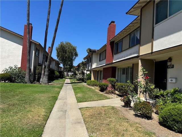 1722 Mitchell Ave Unit 123, Tustin, CA 92780 - view of community featuring a yard and a residential view