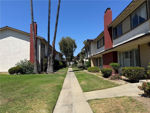 1722 Mitchell Ave Unit 123, Tustin, CA 92780 - view of community with a yard and a residential view