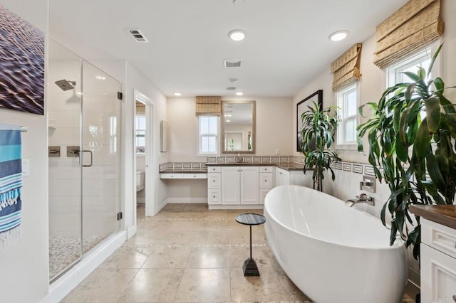196 Coral Cove Way, Encinitas, CA 92024 - bathroom featuring a shower stall, vanity, healthy amount of natural light, a soaking tub, and recessed lighting