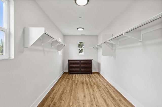 196 Coral Cove Way, Encinitas, CA 92024 - walk in closet with wood finished floors