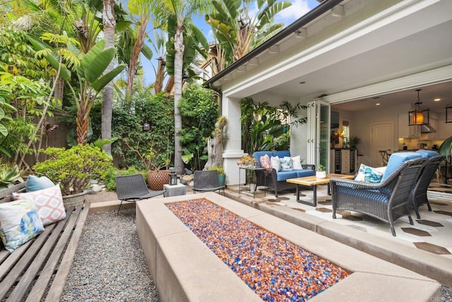 196 Coral Cove Way, Encinitas, CA 92024 - view of patio / terrace featuring an outdoor living space with a fire pit