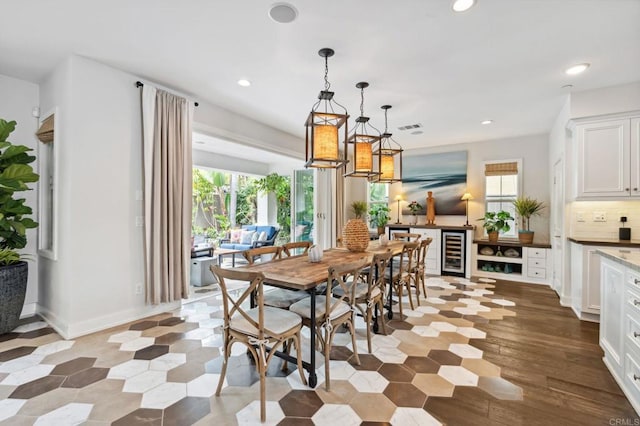 196 Coral Cove Way, Encinitas, CA 92024 - dining space featuring healthy amount of natural light, wine cooler, and recessed lighting