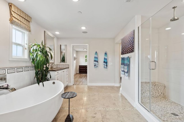 196 Coral Cove Way, Encinitas, CA 92024 - full bathroom featuring a shower stall, a soaking tub, vanity, recessed lighting, and tile patterned flooring