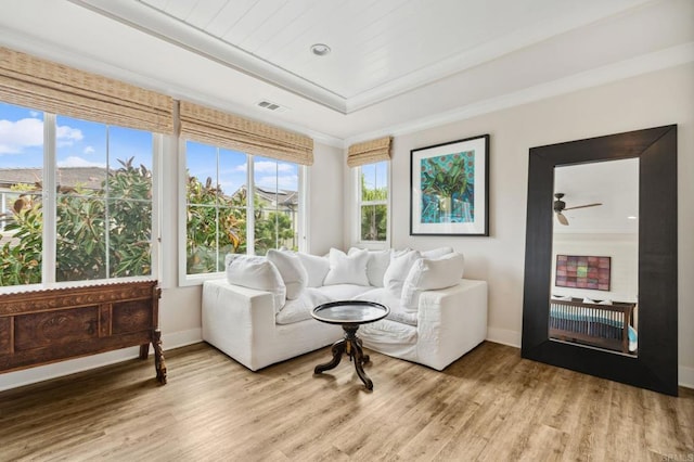 196 Coral Cove Way, Encinitas, CA 92024 - living room with light wood-type flooring, a ceiling fan, and ornamental molding