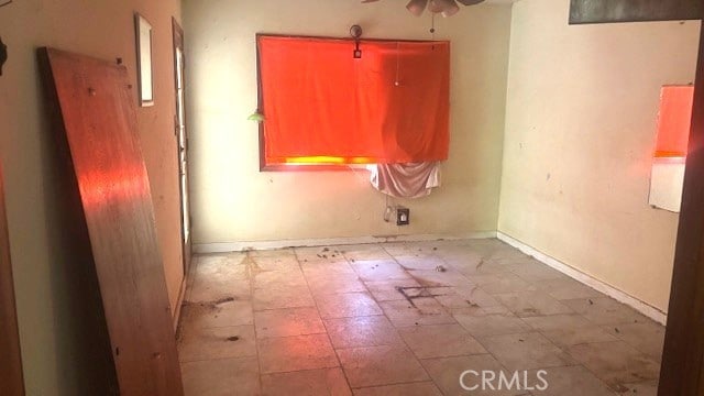 38520 12th St E, Palmdale, CA 93550 - unfurnished room featuring ceiling fan and baseboards