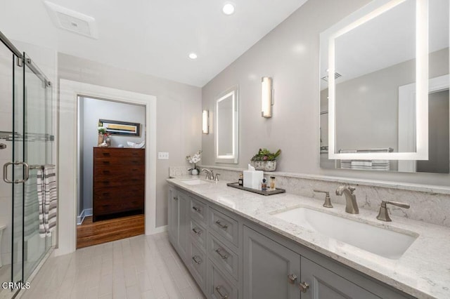 320 N San Rafael Ave, Pasadena, CA 91105 - full bathroom with double vanity, a stall shower, and recessed lighting