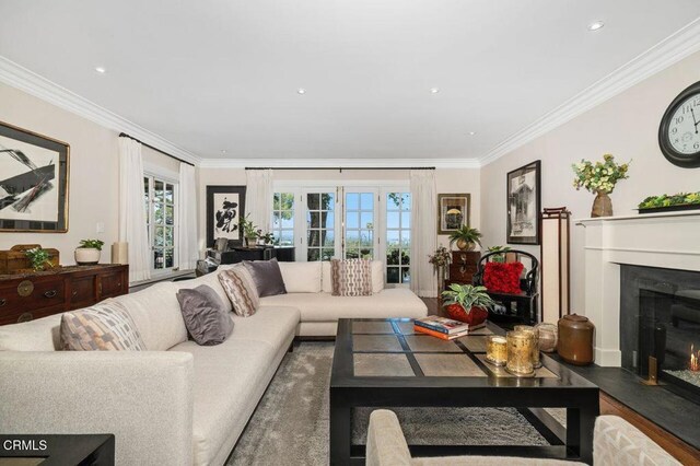 320 N San Rafael Ave, Pasadena, CA 91105 - living area featuring crown molding, plenty of natural light, and a glass covered fireplace