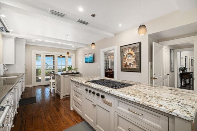 320 N San Rafael Ave, Pasadena, CA 91105 - kitchen with a center island, dark wood-style floors, light stone counters, recessed lighting, and beamed ceiling