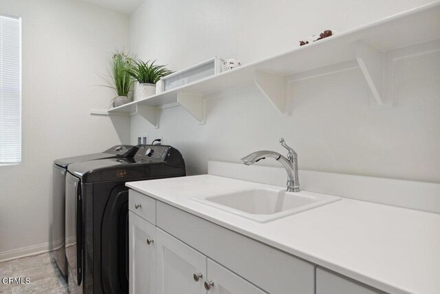 113 Azalea St, Fillmore, CA 93015 - laundry area featuring washing machine and clothes dryer and cabinet space