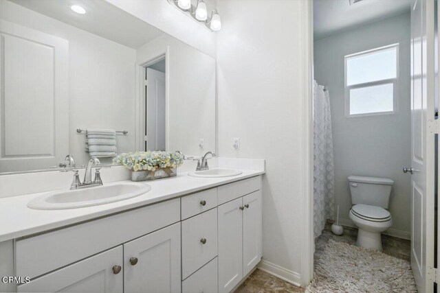 113 Azalea St, Fillmore, CA 93015 - full bathroom with double vanity and toilet