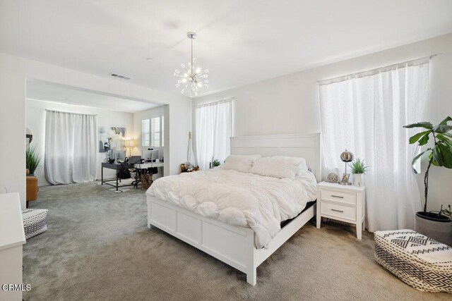 113 Azalea St, Fillmore, CA 93015 - bedroom with a chandelier and carpet