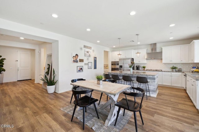 113 Azalea St, Fillmore, CA 93015 - dining room with recessed lighting and light wood finished floors