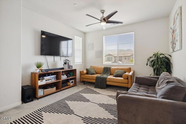 113 Azalea St, Fillmore, CA 93015 - carpeted living area featuring a ceiling fan and baseboards
