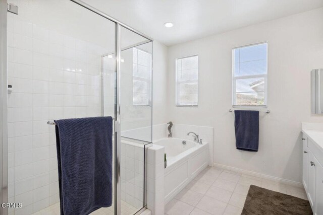 113 Azalea St, Fillmore, CA 93015 - bathroom with vanity, a stall shower, a bath, and tile patterned flooring