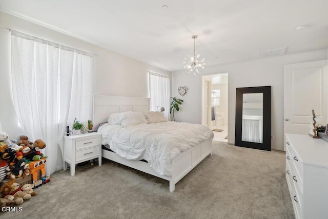 113 Azalea St, Fillmore, CA 93015 - bedroom with a chandelier, light carpet, and ensuite bathroom