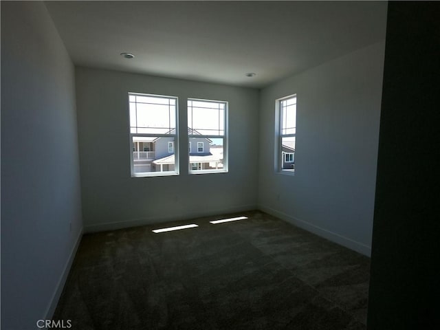 39460 Chamise St, Temecula, CA 92591 - unfurnished room with dark colored carpet and baseboards
