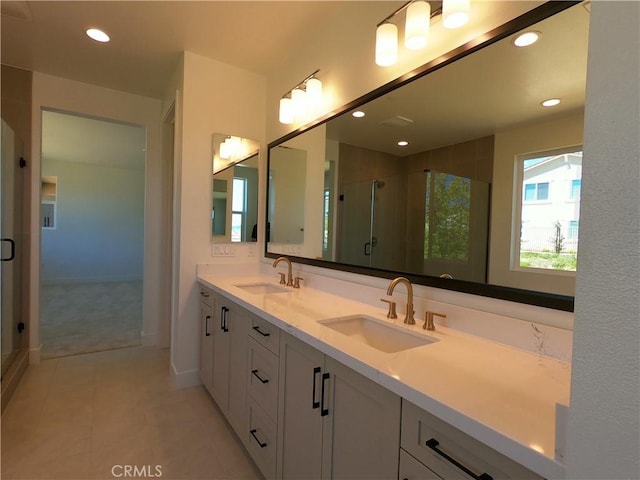 39460 Chamise St, Temecula, CA 92591 - full bathroom with double vanity, a stall shower, tile patterned floors, and recessed lighting