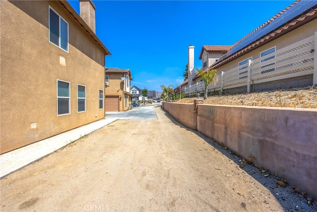 190 Cross Rail Ln, Norco, CA 92860 - view of concrete road featuring a residential view