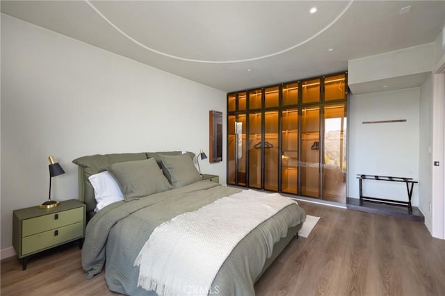 3233 Tareco Dr, Los Angeles, CA 90068 - bedroom featuring wood finished floors