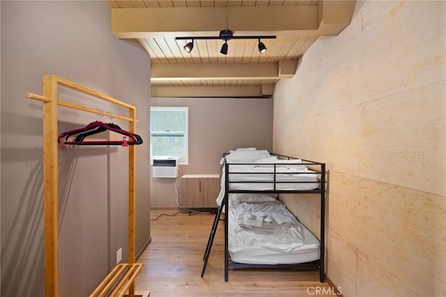 3233 Tareco Dr, Los Angeles, CA 90068 - bedroom with a wooden ceiling with exposed beams, wood finished floors, and cooling unit