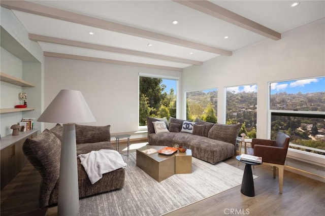 3233 Tareco Dr, Los Angeles, CA 90068 - living area with wood finished floors, beam ceiling, and recessed lighting