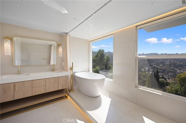 3233 Tareco Dr, Los Angeles, CA 90068 - bathroom with a freestanding tub and double vanity