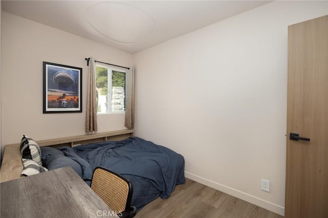 3233 Tareco Dr, Los Angeles, CA 90068 - bedroom featuring light wood finished floors and baseboards